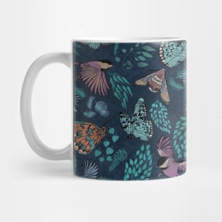 Moody moth, bird and butterfly Mug